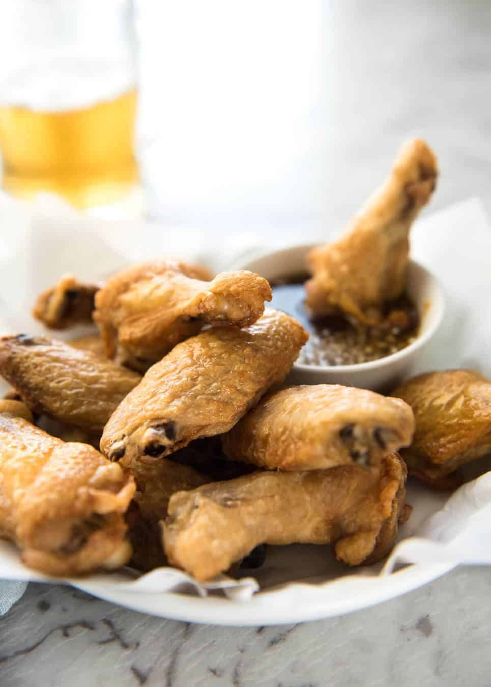 These oven baked wings are so crispy, you will think they've been deep fried! You will be shocked how easy these are to make! dev.recipetineats.com