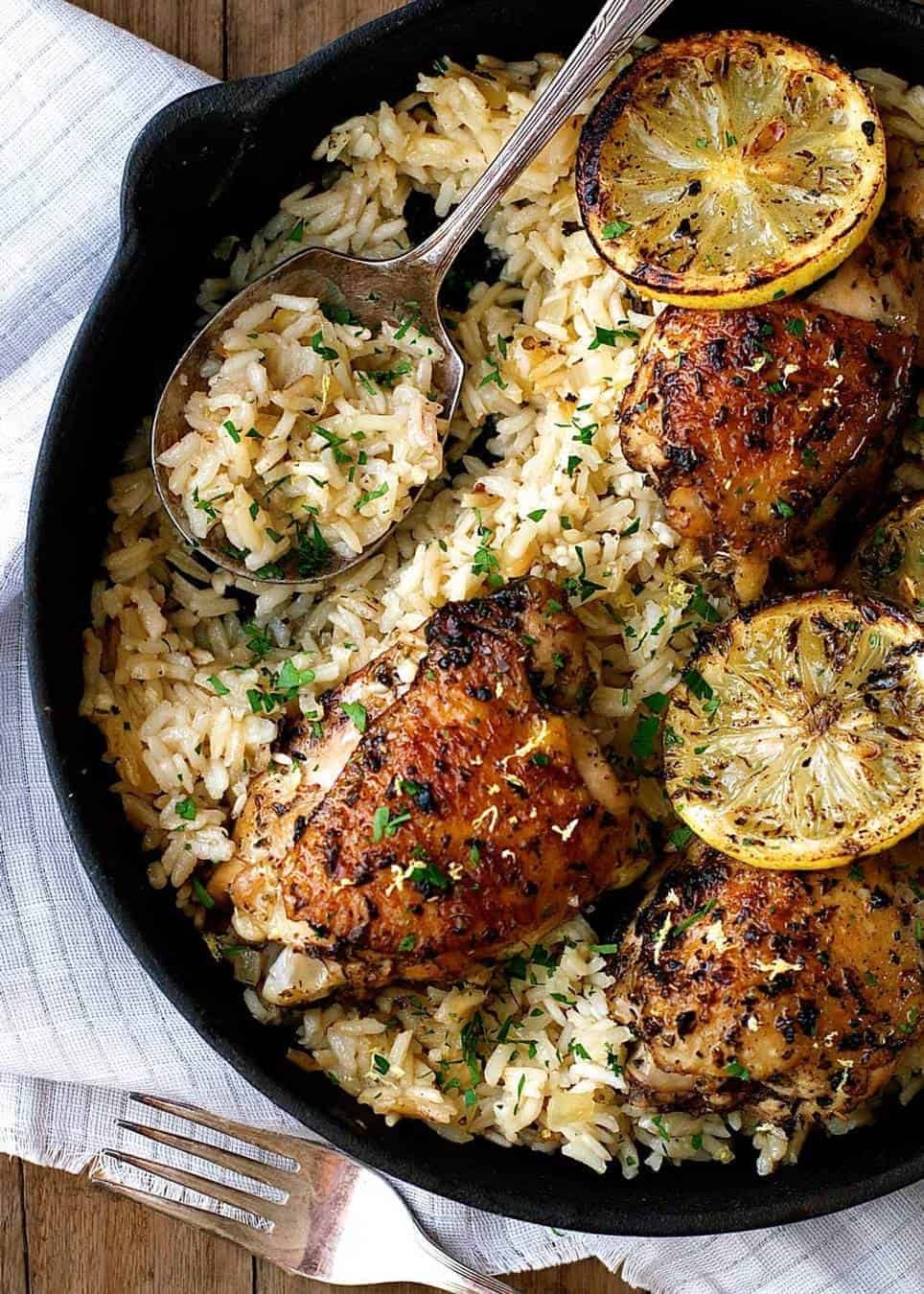 This Greek Chicken Recipe is made with an incredible lemon rice which is all made in ONE POT! dev.recipetineats.com