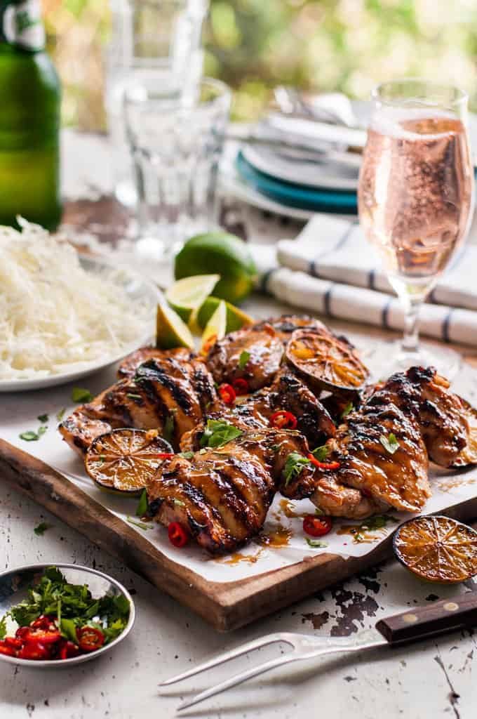 Board with Grilled Thai Chicken (Gai Yang) pieces