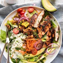 A salad with chicken marinated in pineapple juice, coconut milk & spices and a beautiful cilantro (coriander) lime dressing. The flavours of Hawaii - in a salad! dev.recipetineats.com