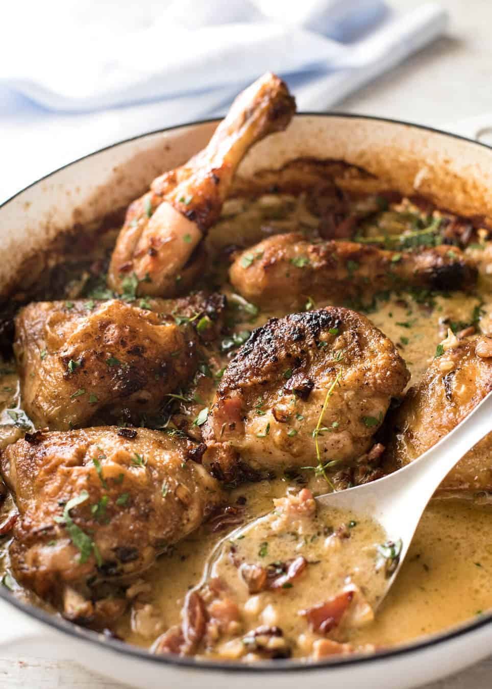 Chicken with Creamy White Wine Sauce and Bacon - So easy to prepare, then just let it braise in the oven until the chicken is tender. The sauce is incredible! dev.recipetineats.com