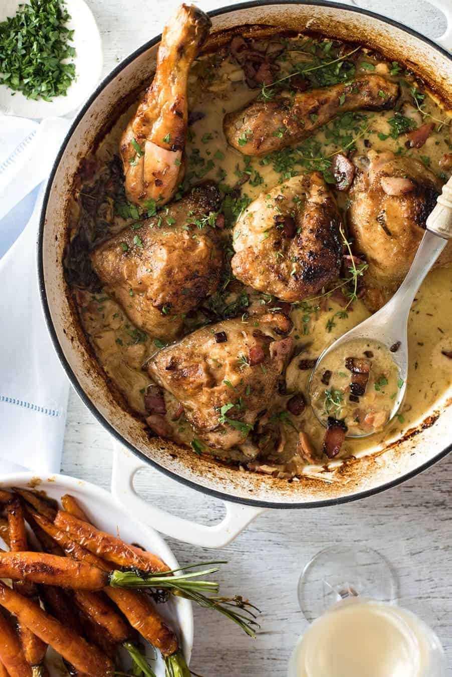 Chicken with Creamy White Wine Sauce and Bacon - So easy to prepare, then just let it braise in the oven until the chicken is tender. The sauce is incredible! dev.recipetineats.com