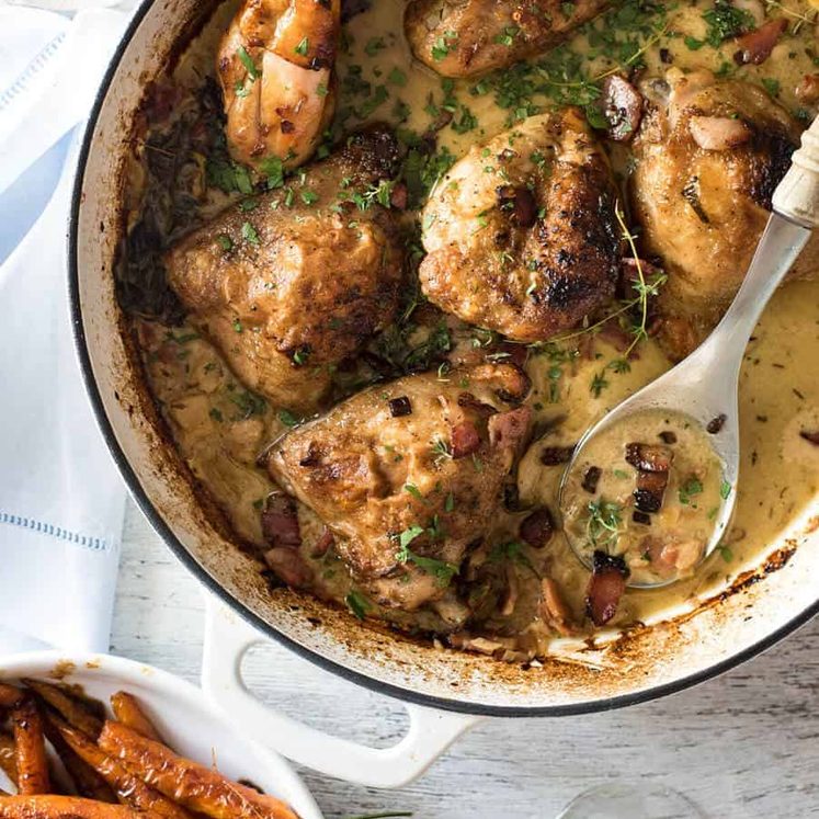 Chicken with Creamy White Wine Sauce and Bacon - So easy to prepare, then just let it braise in the oven until the chicken is tender. The sauce is incredible! dev.recipetineats.com