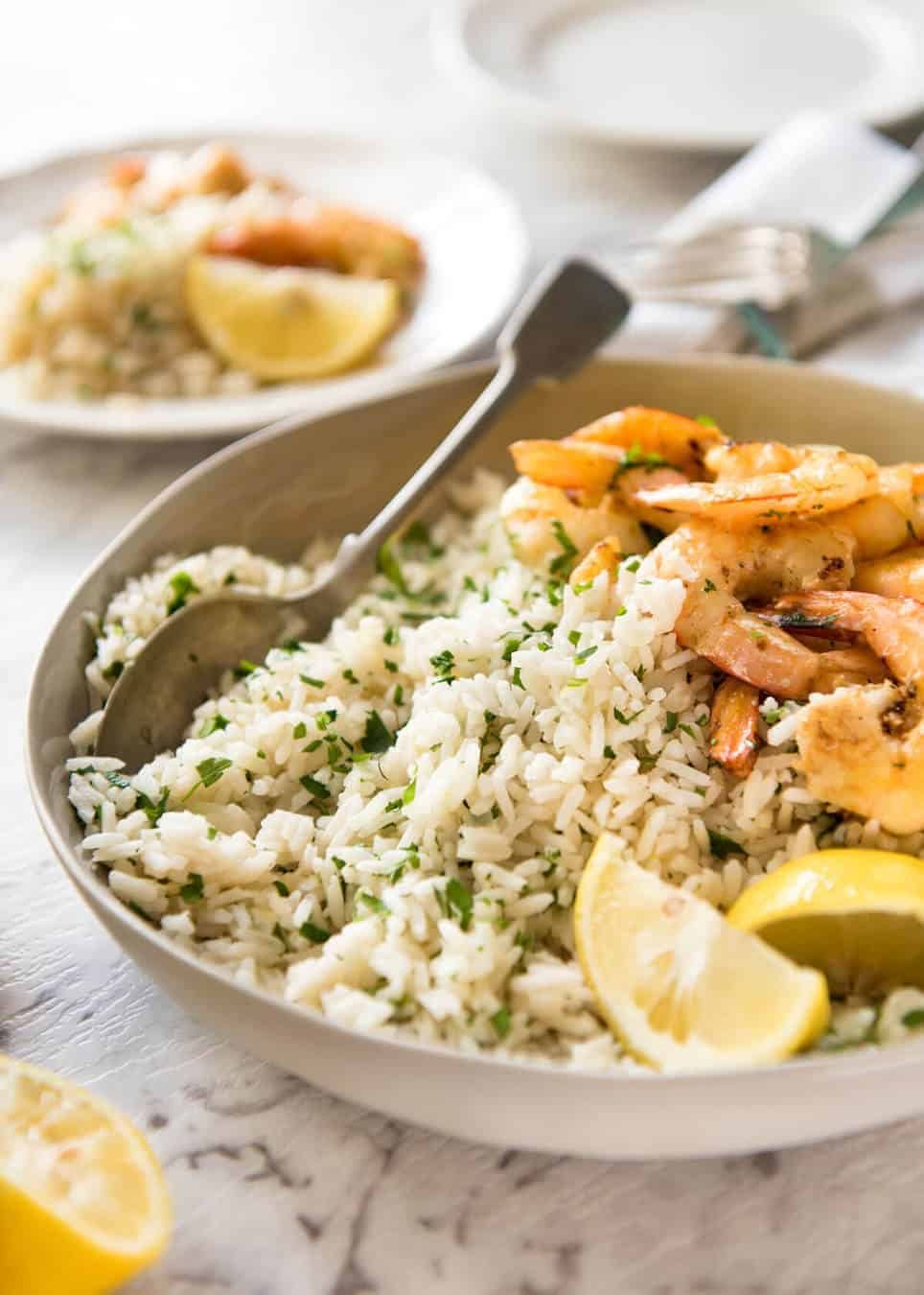 This Lemon Rice Pilaf is so delicious, it can be eaten plain! Lovely bright fresh lemon flavours with herbs. dev.recipetineats.com