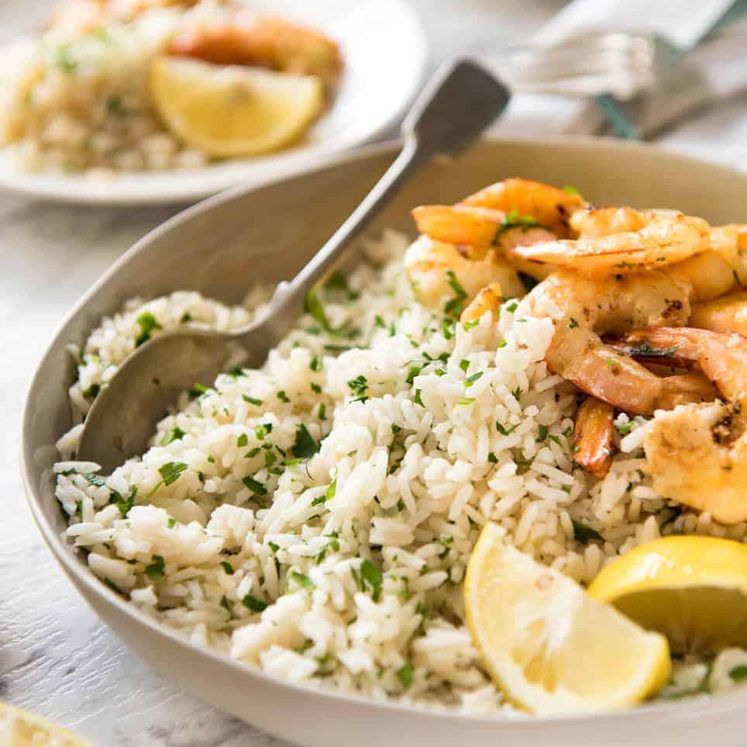 This Lemon Rice Pilaf is so delicious, it can be eaten plain! Lovely bright fresh lemon flavours with herbs. dev.recipetineats.com