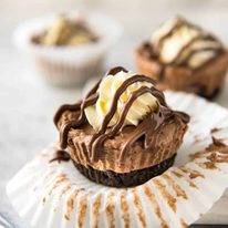 No Bake Nutella Cheesecake - Mini ones made in a muffin tin! A biscuit base and light mousse-like Nutella flavoured cheesecake. Easy to make and completely irresistible! dev.recipetineats.com
