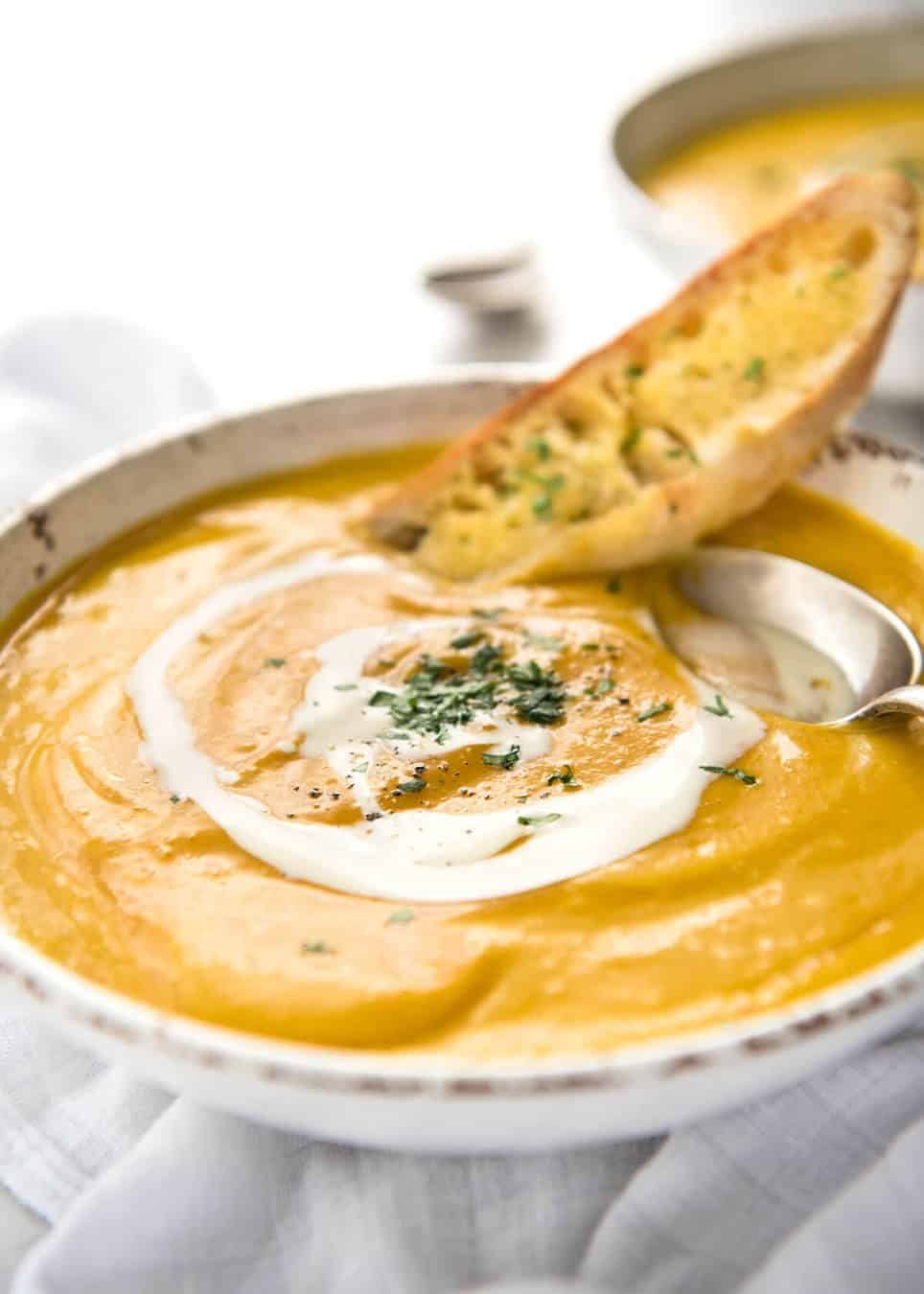 No Chop Roast Pumpkin Soup - An intensely flavoured creamy pumpkin soup made without chopping / peeling pumpkin. dev.recipetineats.com