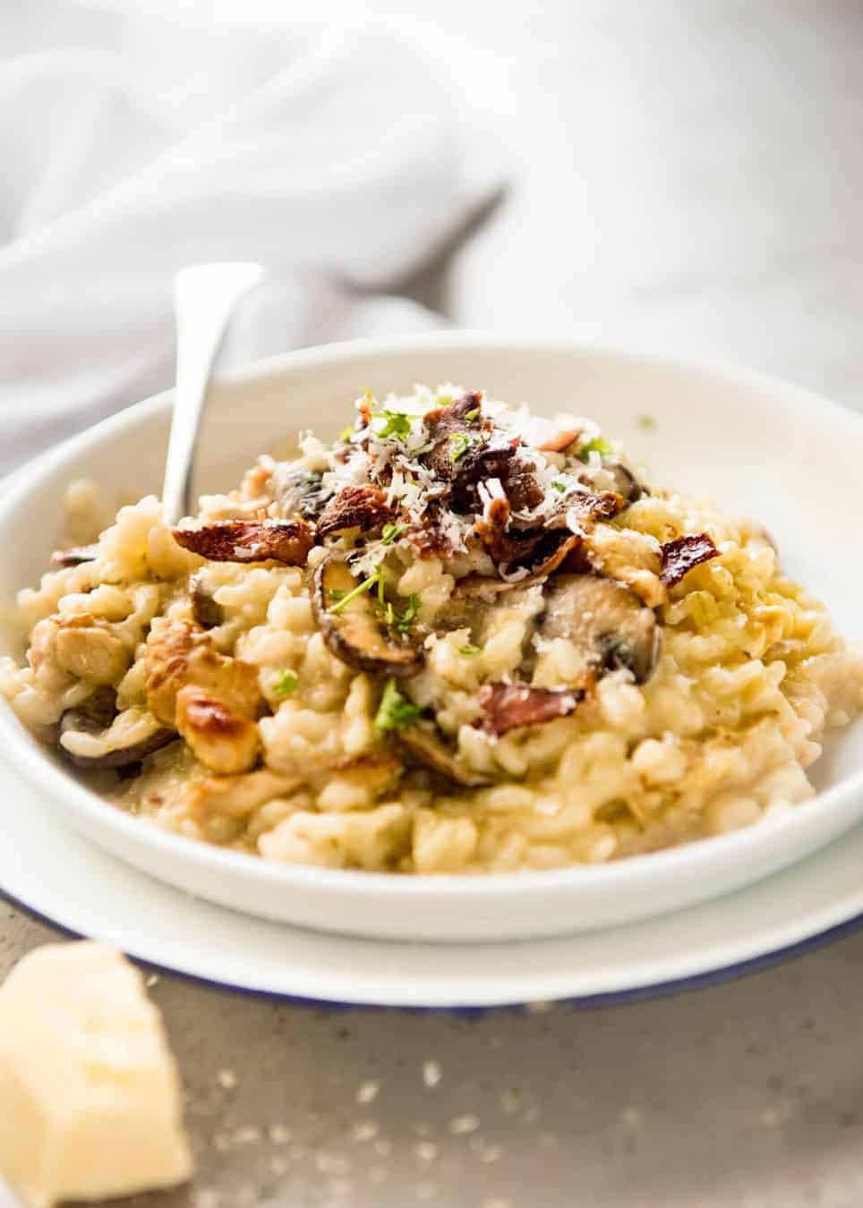 Chicken and Mushroom Risotto - Creamy risotto with golden brown saut&eacute;ed mushrooms and chicken. Easy, perfectly seasoned and beautifully creamy! recipetineats.com