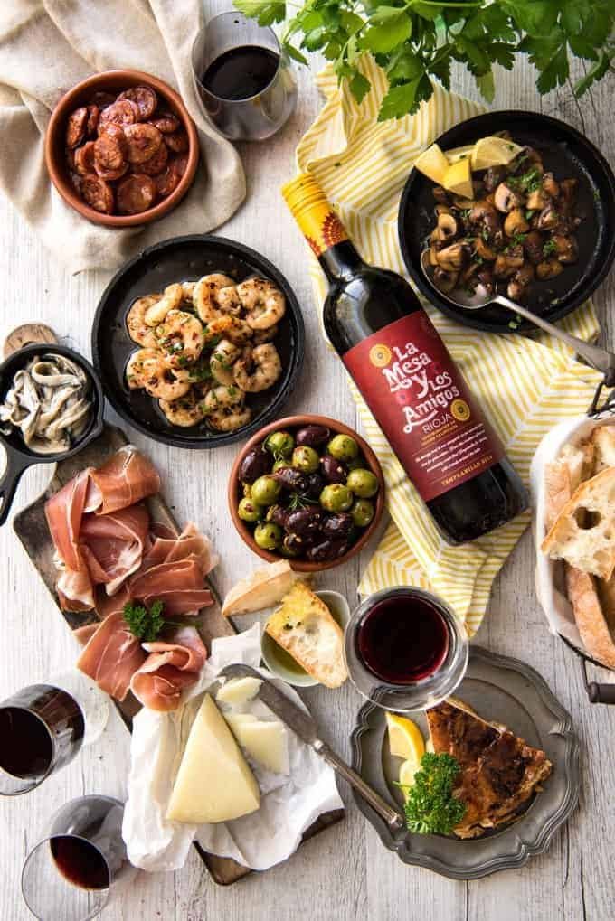5 Easy Spanish Tapas recipes - all your favorites from the tapas bar! Garlic mushrooms, chorizo, garlic shrimp/prawns, Spanish marinated olives , Spanish omelette and a cheese platter! dev.recipetineats.com