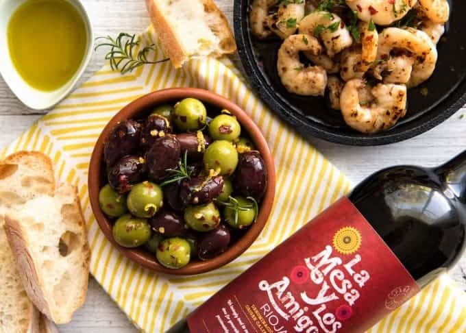 5 Easy Spanish Tapas recipes - all your favorites from the tapas bar! Garlic mushrooms, chorizo, garlic shrimp/prawns, Spanish marinated olives , Spanish omelette and a cheese platter! dev.recipetineats.com