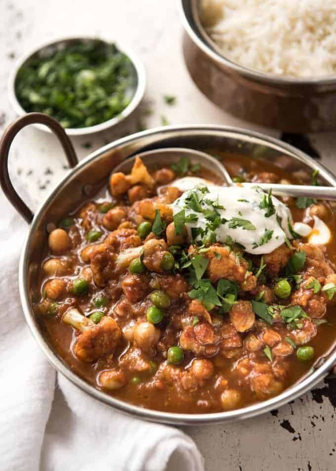 This Cauliflower and Chickpea Curry is an authentic Indian homestyle recipe that's healthy and made with everyday ingredients! dev.recipetineats.com