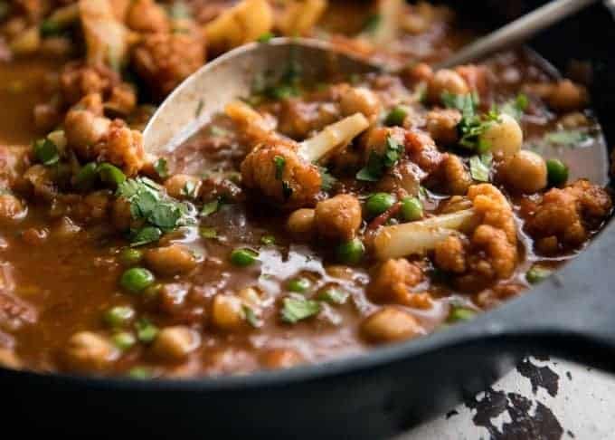 This Cauliflower and Chickpea Curry is an authentic Indian homestyle recipe that's healthy and made with everyday ingredients! dev.recipetineats.com