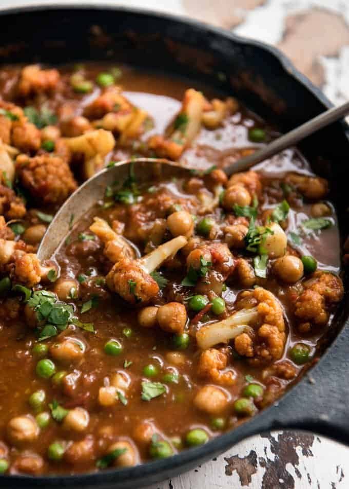 This Cauliflower and Chickpea Curry is an authentic Indian homestyle recipe that's healthy and made with everyday ingredients! dev.recipetineats.com