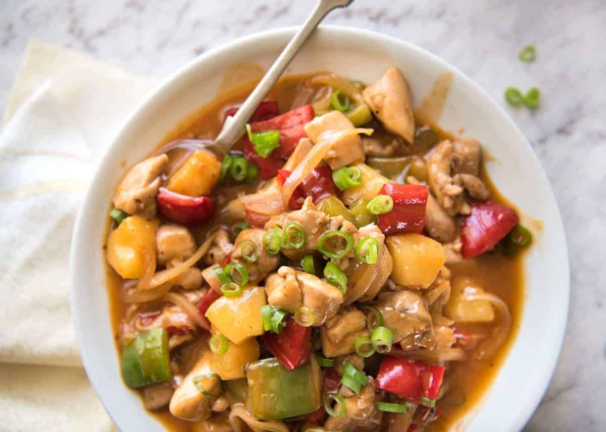 Bright and colourful, this Sweet and Sour Chicken Stir Fry is made with a sauce that rivals the best Chinese restaurants! dev.recipetineats.com
