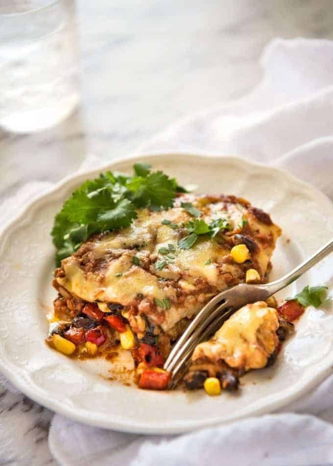 Vegetarian Mexican Caserole (Lasagna) - Fresh, healthy and loaded with Mexican flavours, just 342 calories per serving! dev.recipetineats.com