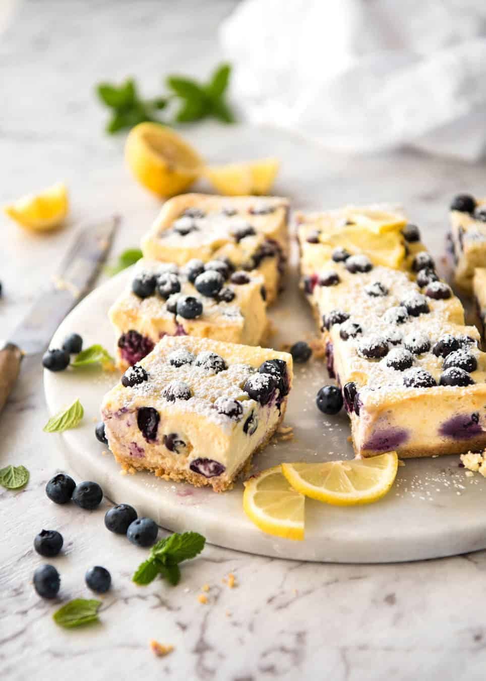 These Blueberry Cheesecake Bars are light yet creamy and luscious. Filled with soft blueberries, this is a baked cheesecake that's so easy to make! dev.recipetineats.com