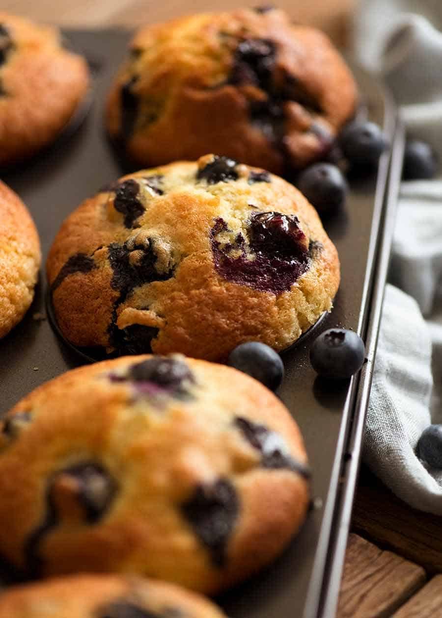Blueberry Muffins in a muffin tin, fresh out of the oven