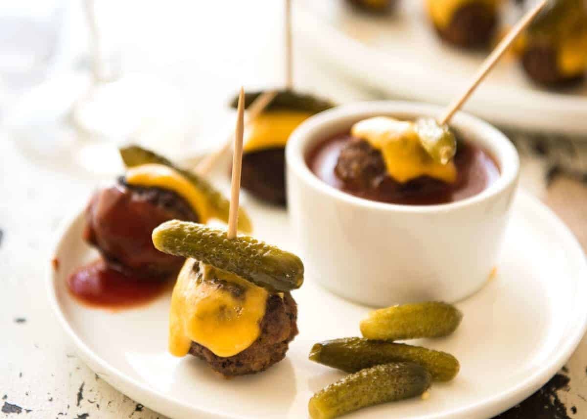 Cheeseburger Party Meatballs - tastes like a cheeseburger, in bite size form! Great for making ahead - fully assemble (inc toothpicks), 90 sec reheat in microwave. dev.recipetineats.com