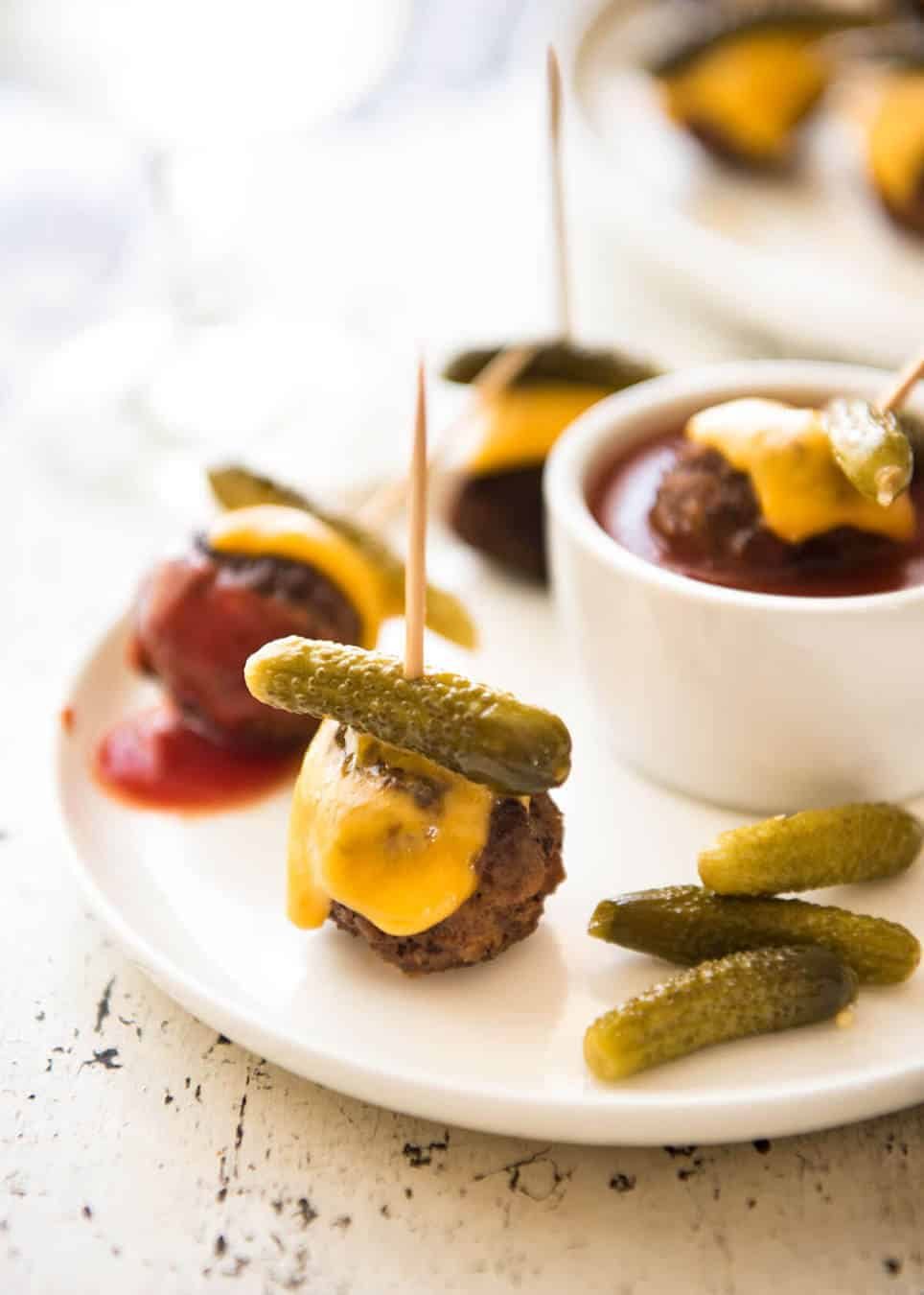 Cheeseburger Party Meatballs - tastes like a cheeseburger, in bite size form! Great for making ahead - fully assemble (inc toothpicks), 90 sec reheat in microwave. dev.recipetineats.com