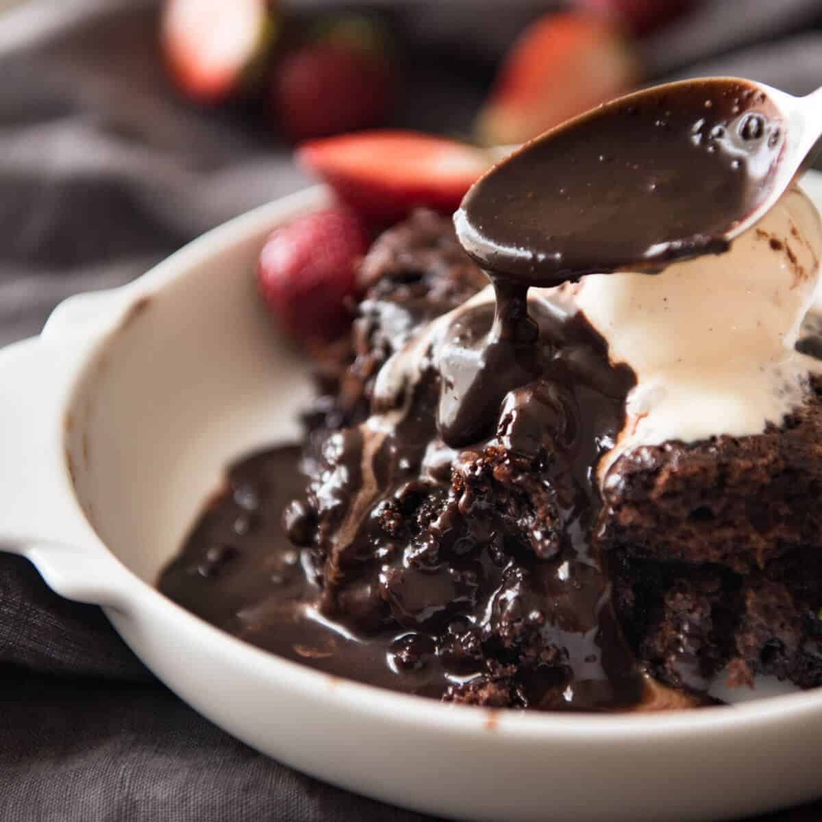 Chocolate Self Saucing Pudding - 1 batter transforms into a moist chocolate cake with a beautiful silky chocolate sauce! 10 minutes active effort. dev.recipetineats.com