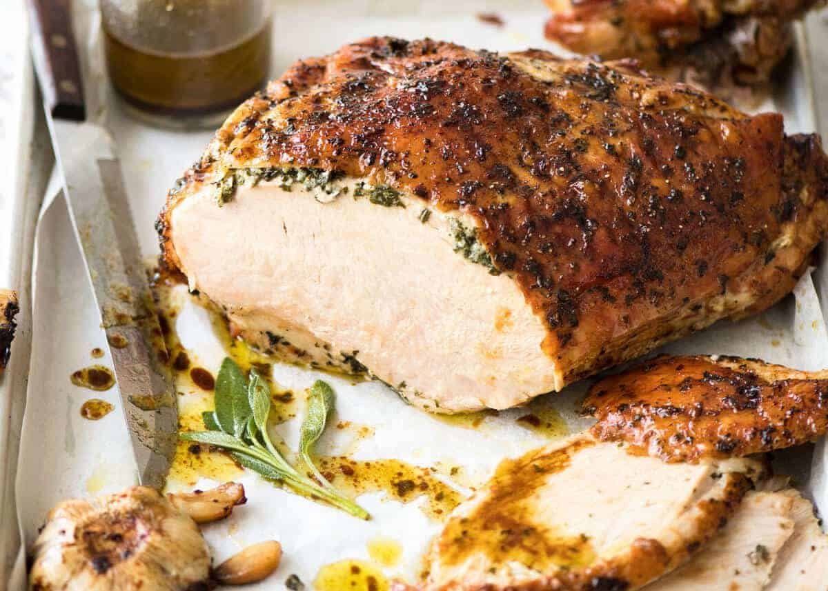 Garlic Herb Butter Roasted Turkey Breast with herb butter under the skin. Quick video tutorial provided. This is food so good, it will make you want to cry! dev.recipetineats.com