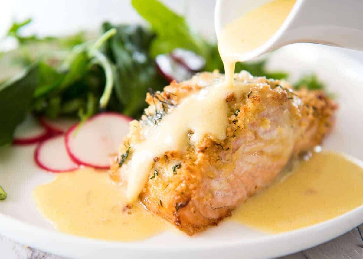 Baked Parmesan Crusted Salmon with Lemon Cream Sauce - easy and fast to make, can be prepared ahead, a stunning centrepiece for Christmas dinner and yet easy enough for midweek. That Lemon Cream sauce is the perfectly finishing tough. dev.recipetineats.com
