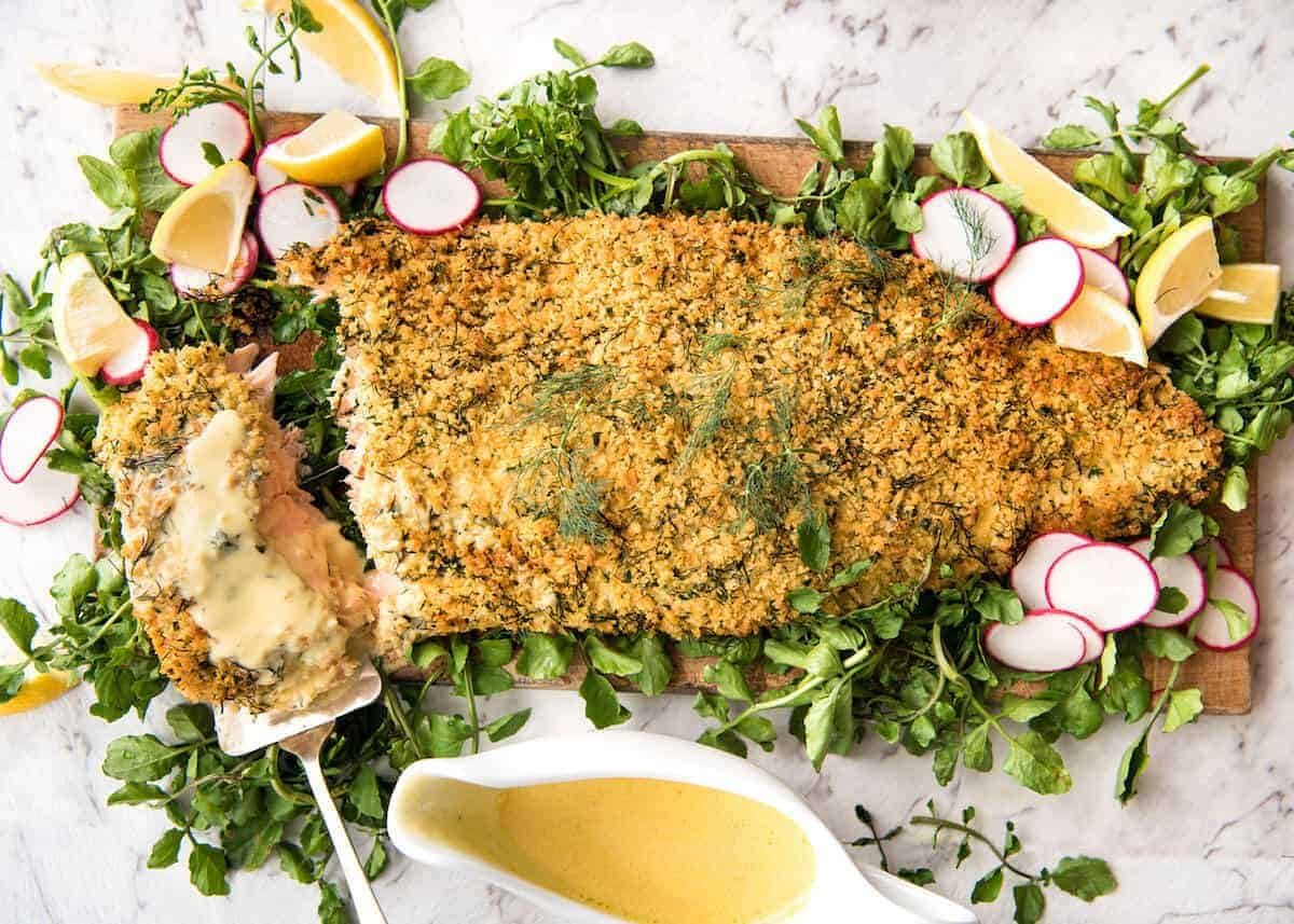 Baked Parmesan Crusted Salmon with Lemon Cream Sauce - easy and fast to make, can be prepared ahead, a stunning centrepiece for Christmas dinner and yet easy enough for midweek. That Lemon Cream sauce is the perfectly finishing tough. dev.recipetineats.com