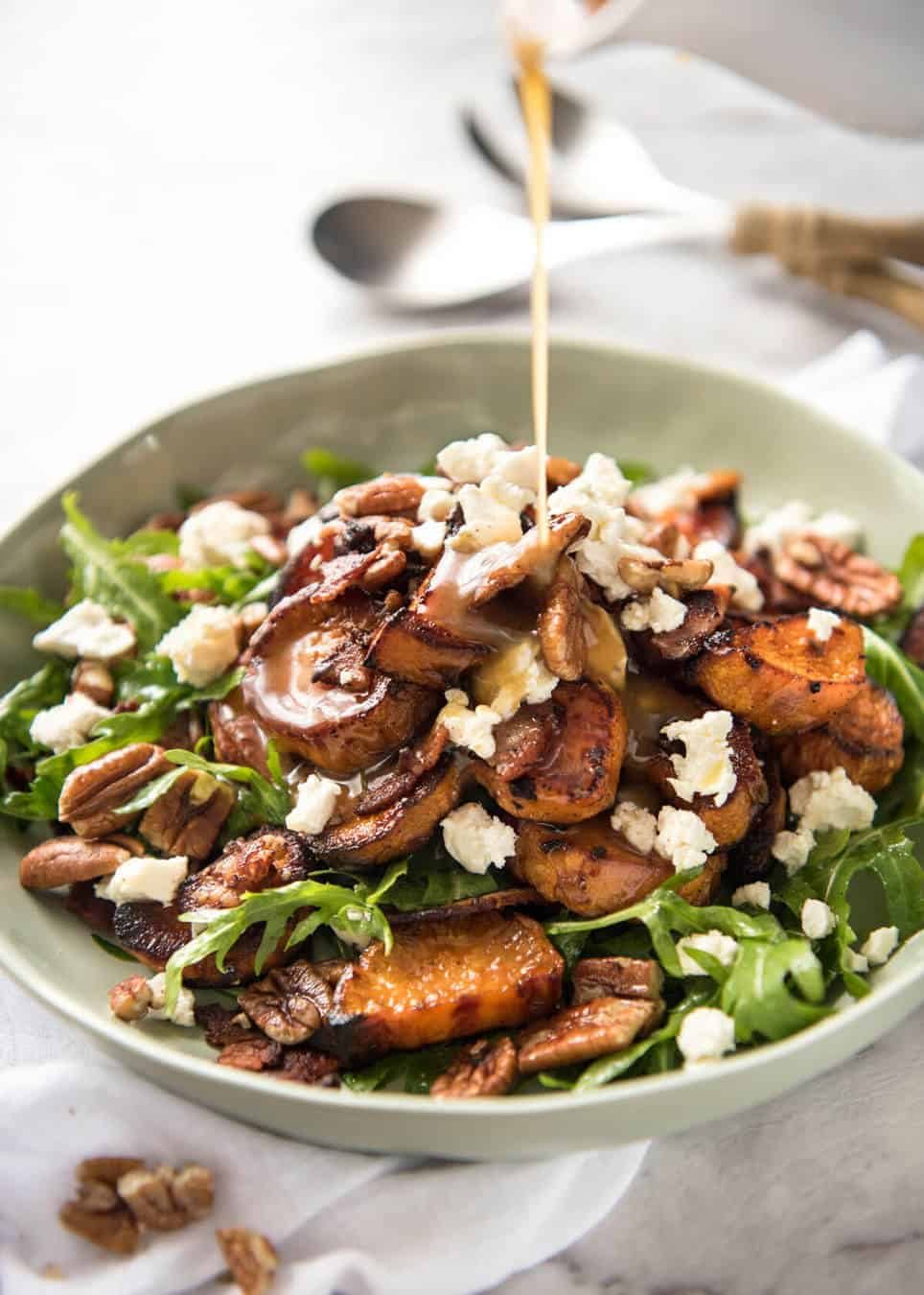 Roasted Sweet Potato Salad - with arugula/rocket, pecans, goats cheese or feta, a sprinkle of bacon and a beautiful Honey Lemon dressing. dev.recipetineats.com