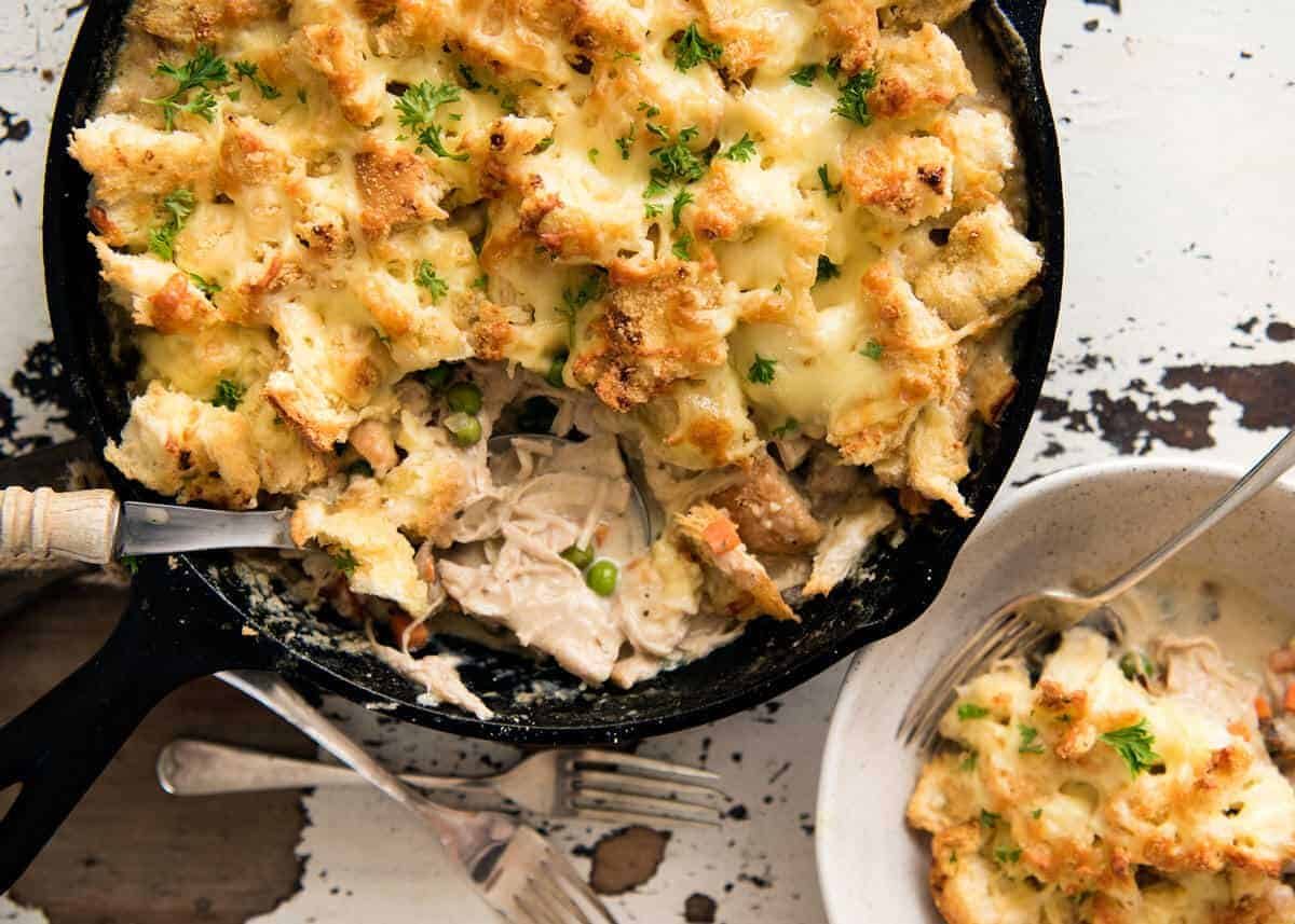 Leftover Turkey Pot Pie: Made with leftover turkey and topped with leftover bread transformed into a cheesy garlic bread topping! dev.recipetineats.com