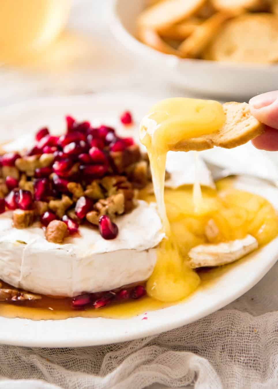 3 Minute Melty Festive Brie - Just microwave for 1 minute and you have an almost-instant baked brie appetizer! dev.recipetineats.com