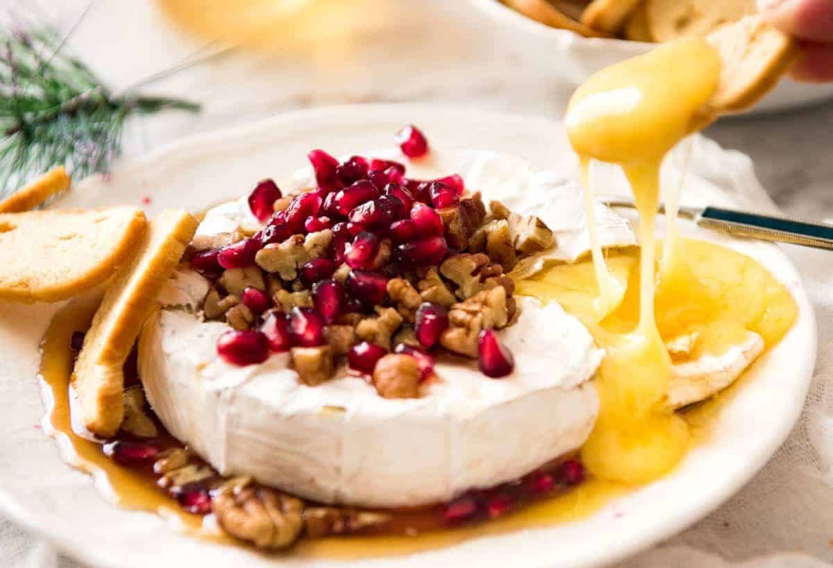 3 Minute Melty Festive Brie - Just microwave for 1 minute and you have an almost-instant baked brie appetizer! dev.recipetineats.com