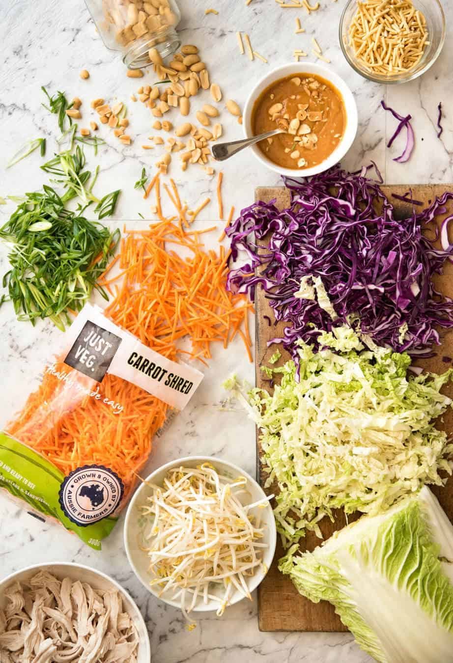 Chinese Chicken Salad with Asian Peanut Salad Dressing - made with cabbage, shredded chicken, crunchy noodles, carrot and a killer peanut dressing! dev.recipetineats.com