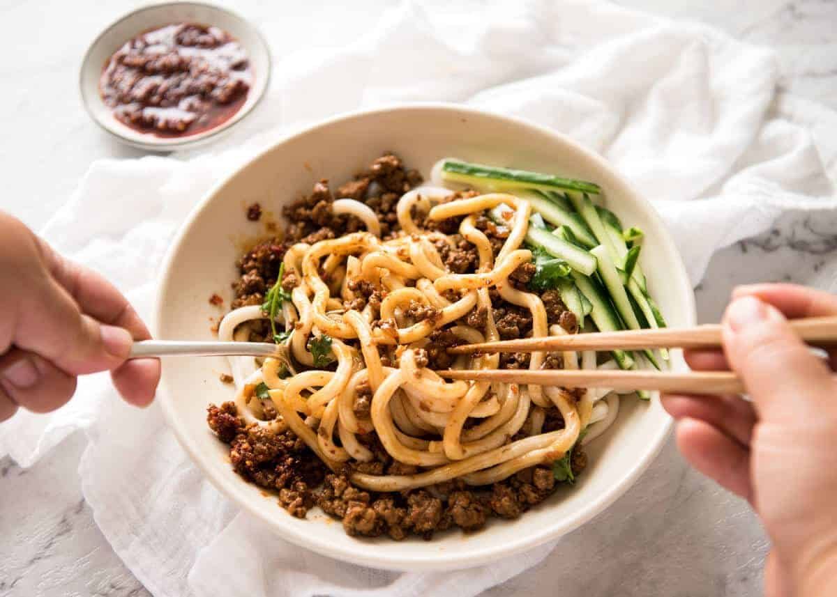Chinese Pork with Noodles (Zha Jiang Mian) - Super quick and super tasty, affectionally known as "Chinese Bolognese". The pork is savoury with a touch of heat and spice, perfect mixed through noodles! dev.recipetineats.com