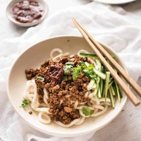 Chinese Pork with Noodles (Zha Jiang Mian) - Super quick and super tasty, affectionally known as "Chinese Bolognese". The pork is savoury with a touch of heat and spice, perfect mixed through noodles! dev.recipetineats.com