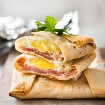 No Washing Up Ham Egg Cheese Pockets - Place ham on a wrap/tortilla, top with a ring of shredded cheese, crack an egg inside, wrap with foil and bake. Voila! A hot breakfast pocket! dev.recipetineats.com