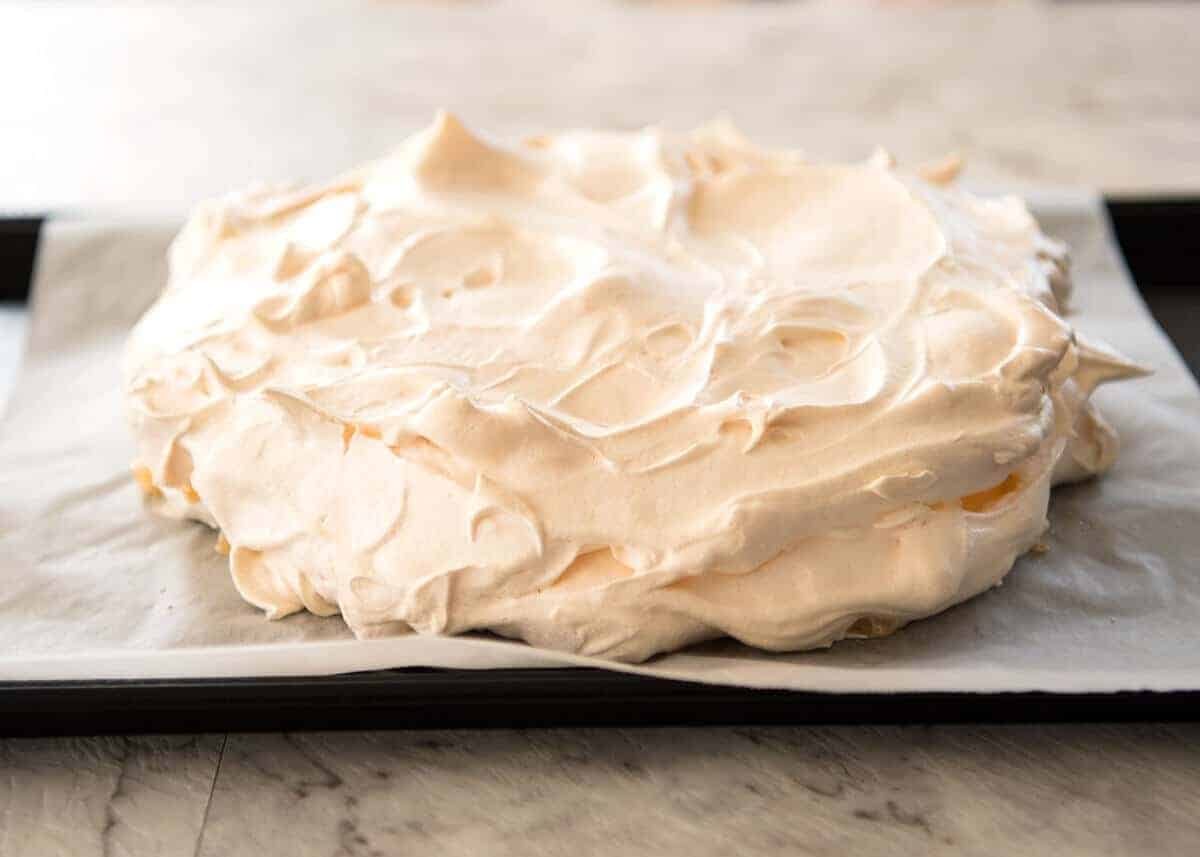 Classic Pavlova recipe with easy to follow tips that make all the difference for a perfect Pav, every time! dev.recipetineats.com