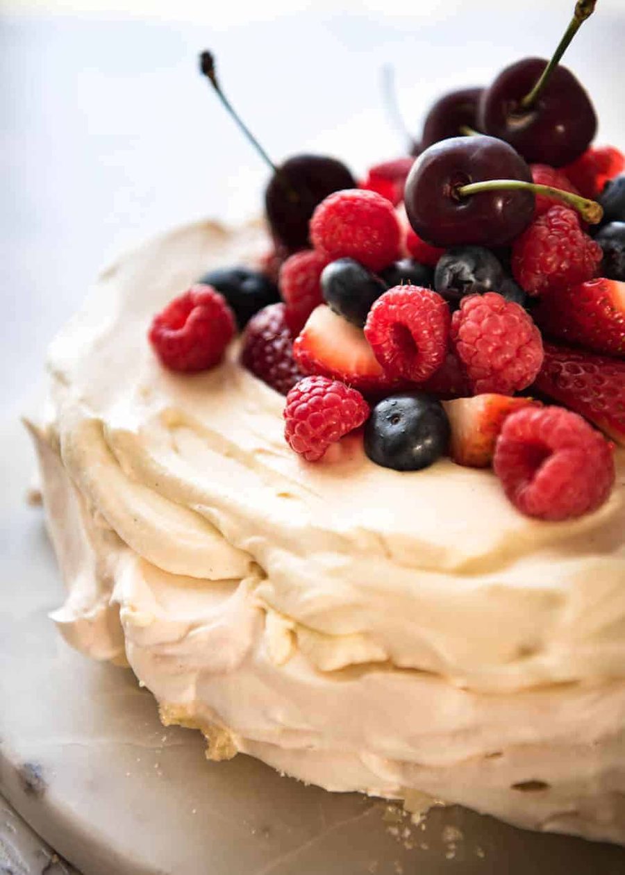Classic Pavlova recipe with easy to follow tips that make all the difference for a perfect Pav, every time! dev.recipetineats.com