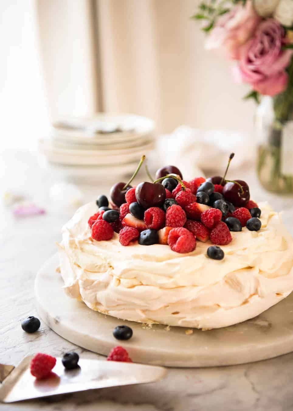 Classic Pavlova recipe with easy to follow tips that make all the difference for a perfect Pav, every time! dev.recipetineats.com