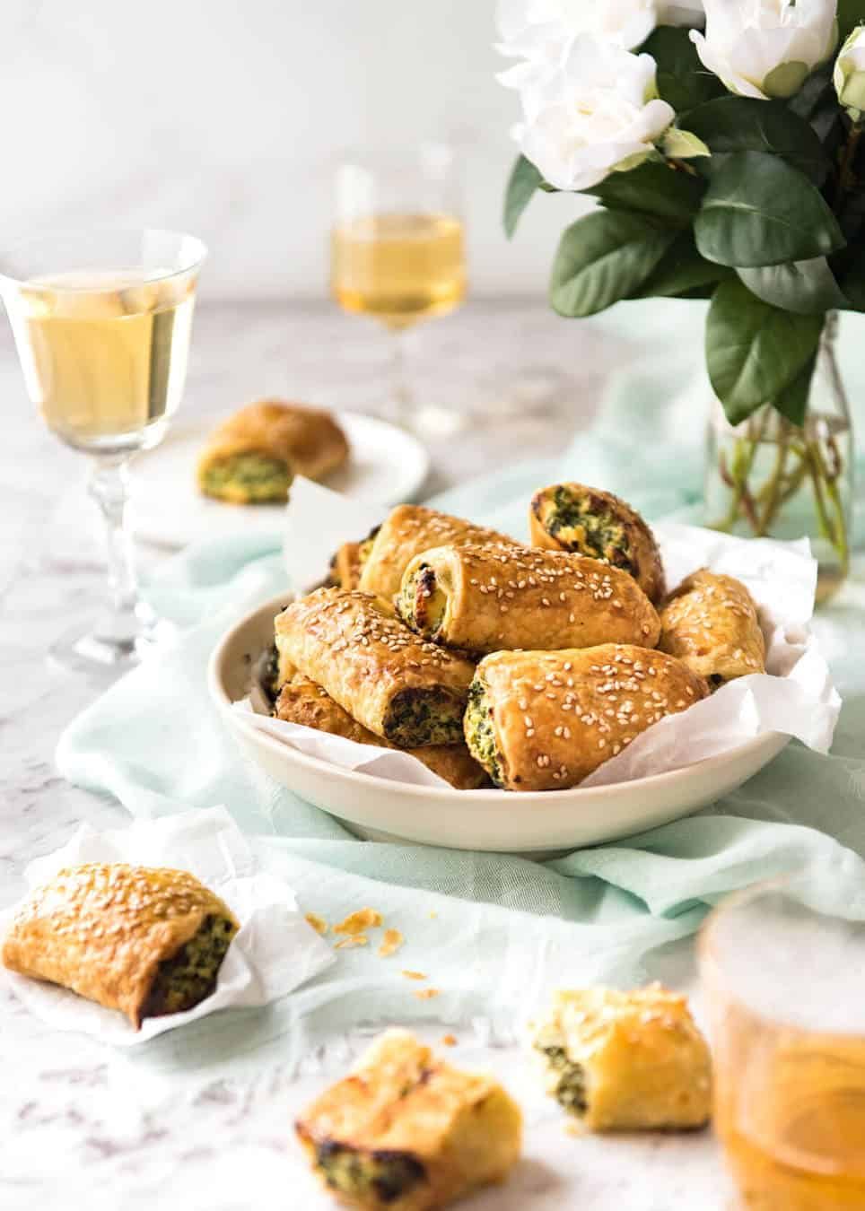 Spinach and Ricotta Rolls - a moist cheesy filling enclosed with buttery flaky puff pastry. Great make ahead for freezing! dev.recipetineats.com