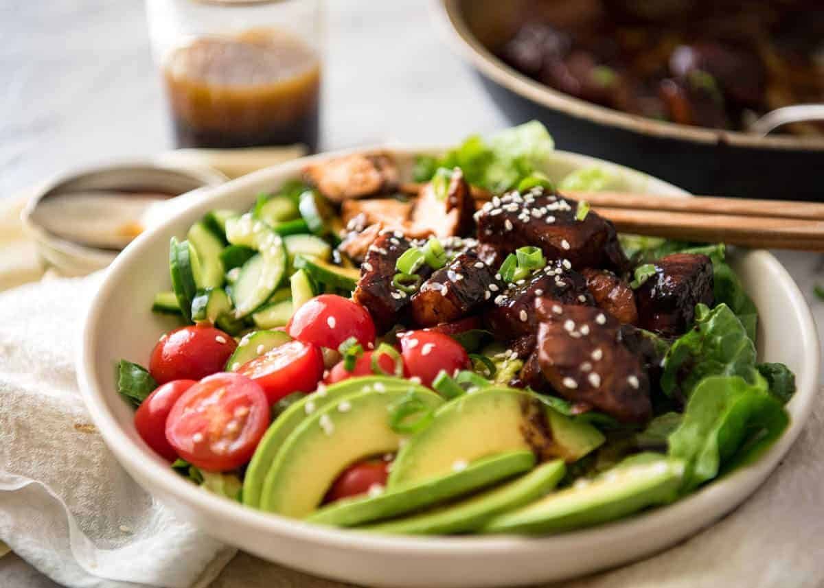 Asian Salmon Salad - Salmon dripping in a gorgeous Asian glaze on a fresh, vibrant salad drizzled with sesame dressing. Quick to make, packed with serious flavour! dev.recipetineats.com