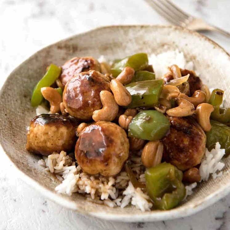 This Chinese Cashew Chicken Meatball recipe is everything you know and love about Cashew Chicken...made with meatballs! dev.recipetineats.com