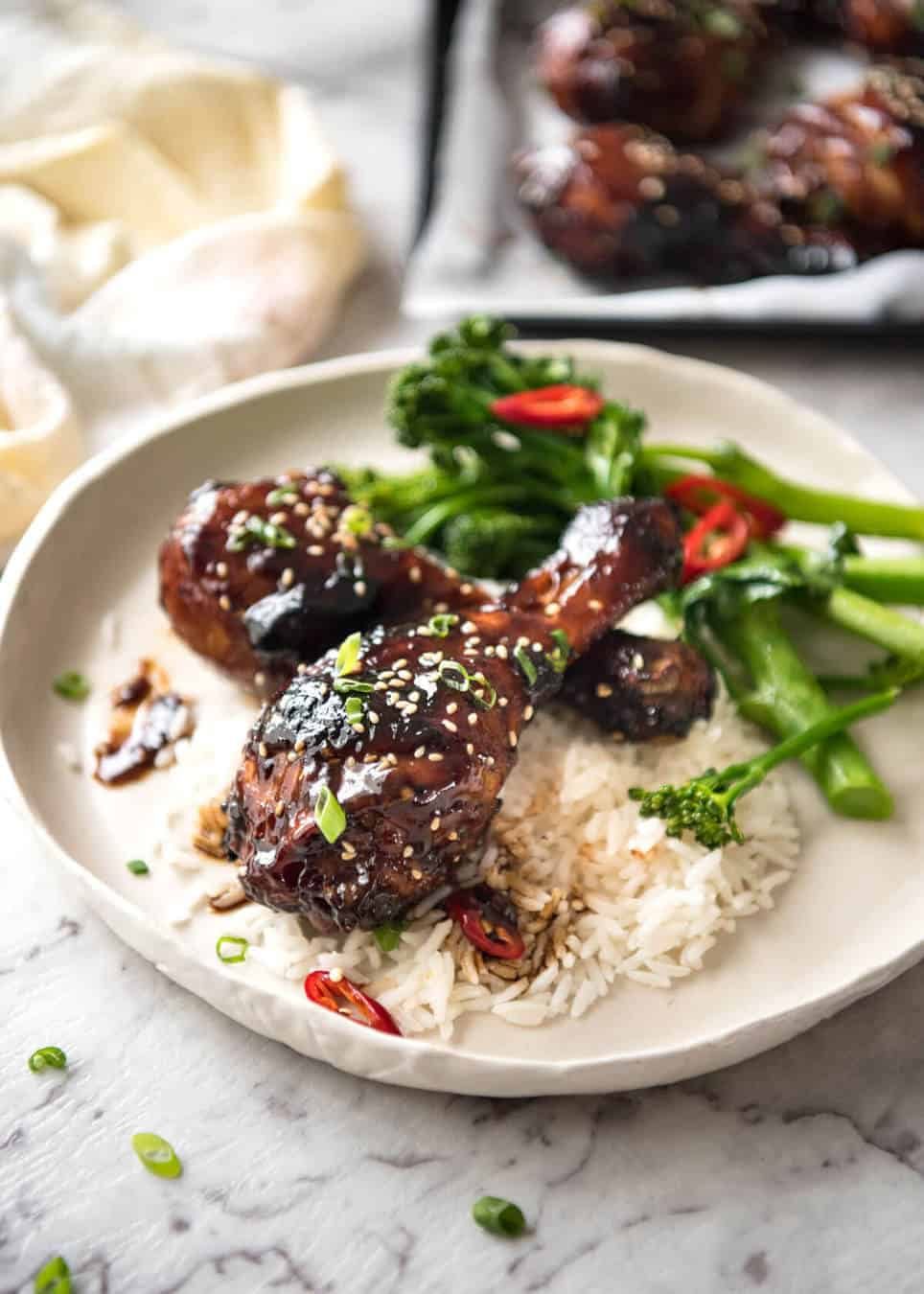 Sticky Chicken Drumsticks in Chinese Plum Sauce - Just a handful of ingredients, 5 minutes prep and awesome stickiness! dev.recipetineats.com