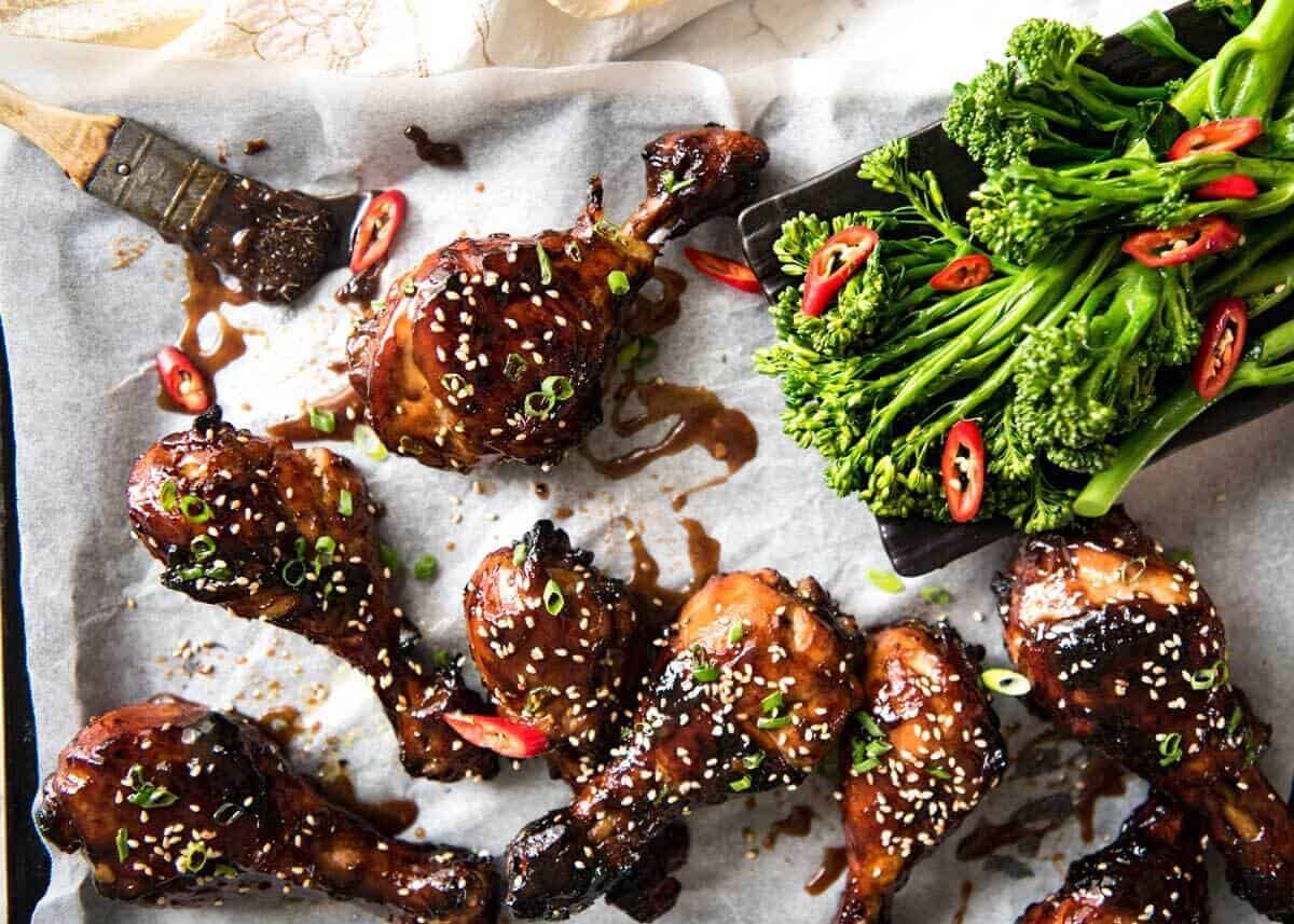 Sticky Chicken Drumsticks in Chinese Plum Sauce - Just a handful of ingredients, 5 minutes prep and awesome stickiness! dev.recipetineats.com