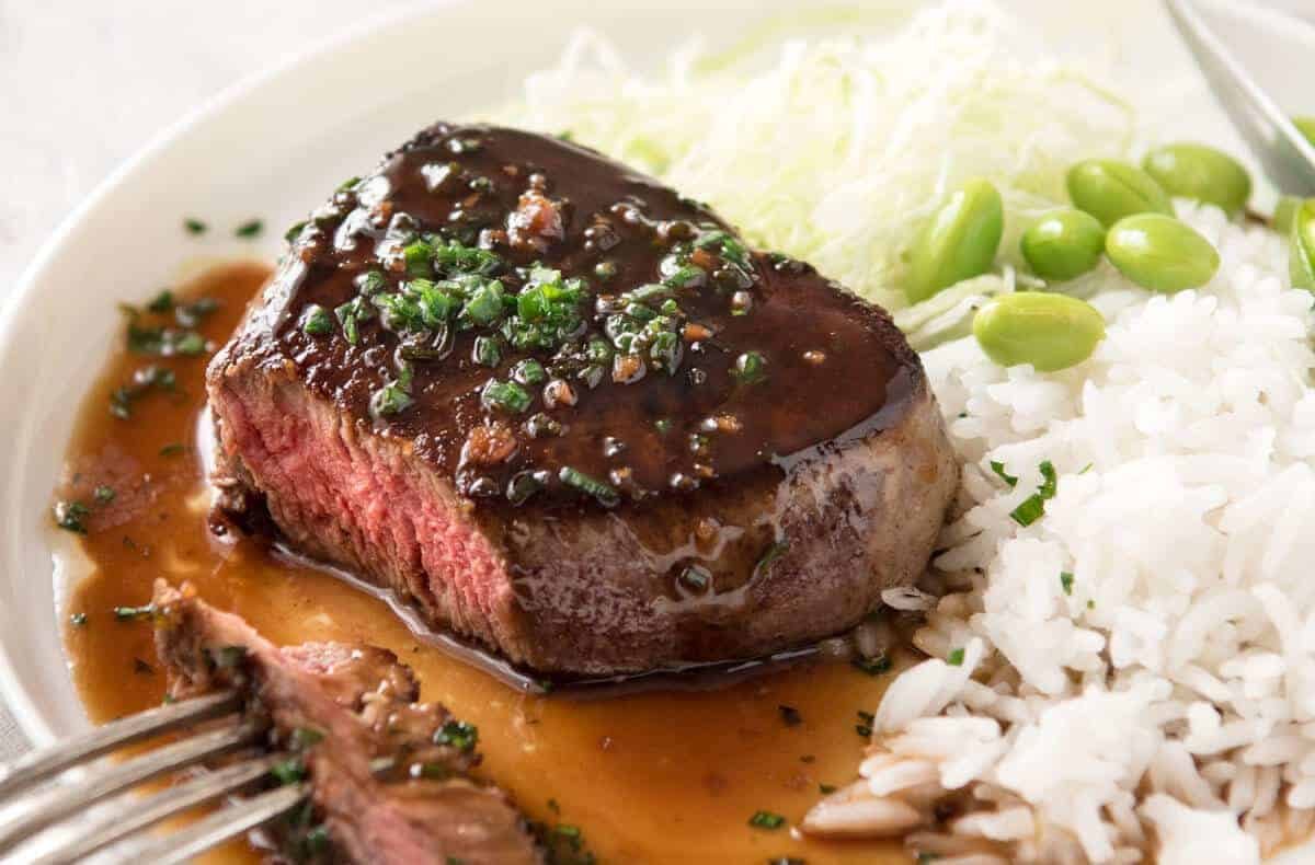 Simple yet stunning Asian Steak with a sauce inspired by the great Tetsuya! All you need is 15 minutes, soy sauce, mirin, sake or sherry, butter, garlic and ginger. Amazing! dev.recipetineats.com