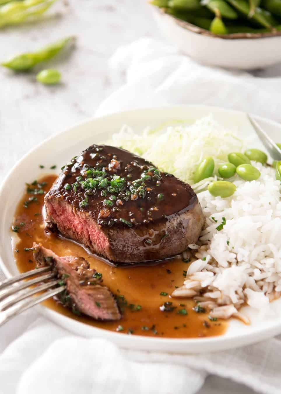 Simple yet stunning Asian Steak with a sauce inspired by the great Tetsuya! All you need is 15 minutes, soy sauce, mirin, sake or sherry, butter, garlic and ginger. Amazing! dev.recipetineats.com
