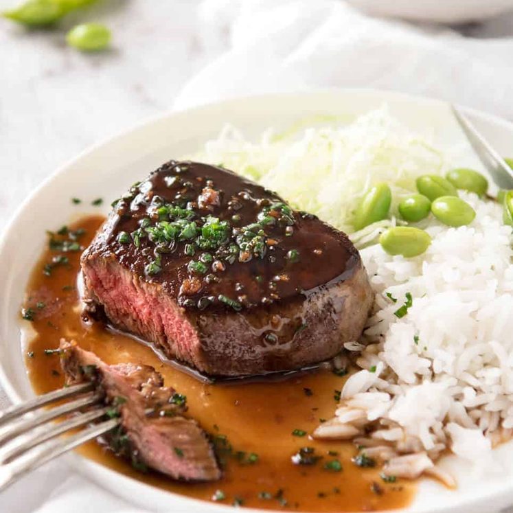 Simple yet stunning Asian Steak with a sauce inspired by the great Tetsuya! All you need is 15 minutes, soy sauce, mirin, sake or sherry, butter, garlic and ginger. Amazing! dev.recipetineats.com