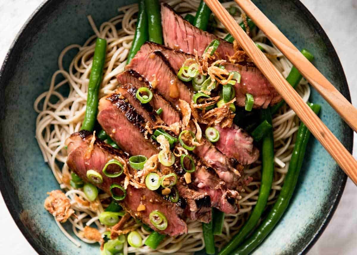 Beef Soba Noodle Bowl - Super quick to make and tastes absolutely incredible. The dressing is so tasty! dev.recipetineats.com