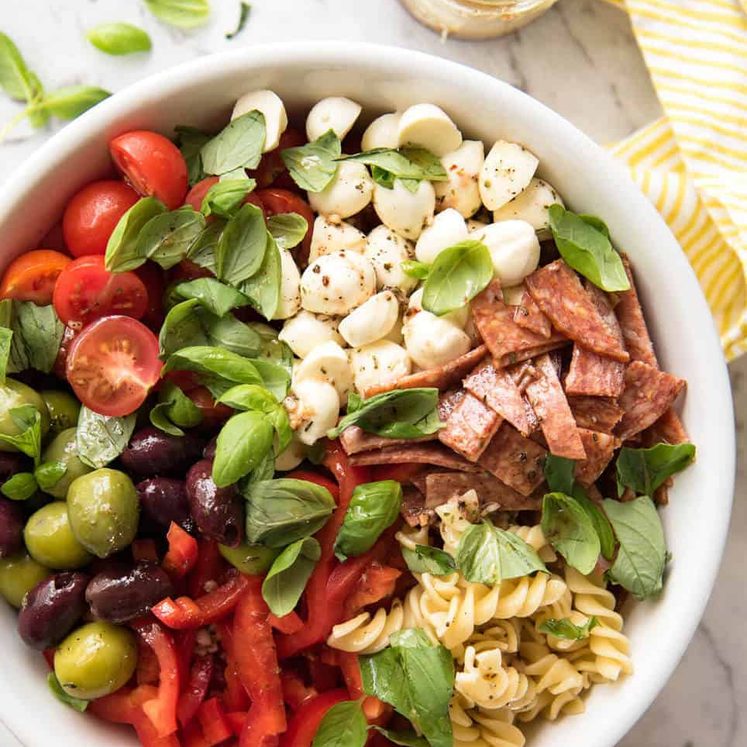 This Italian Pasta Salad with Homemade Italian Dressing is a hit at gatherings! dev.recipetineats.com