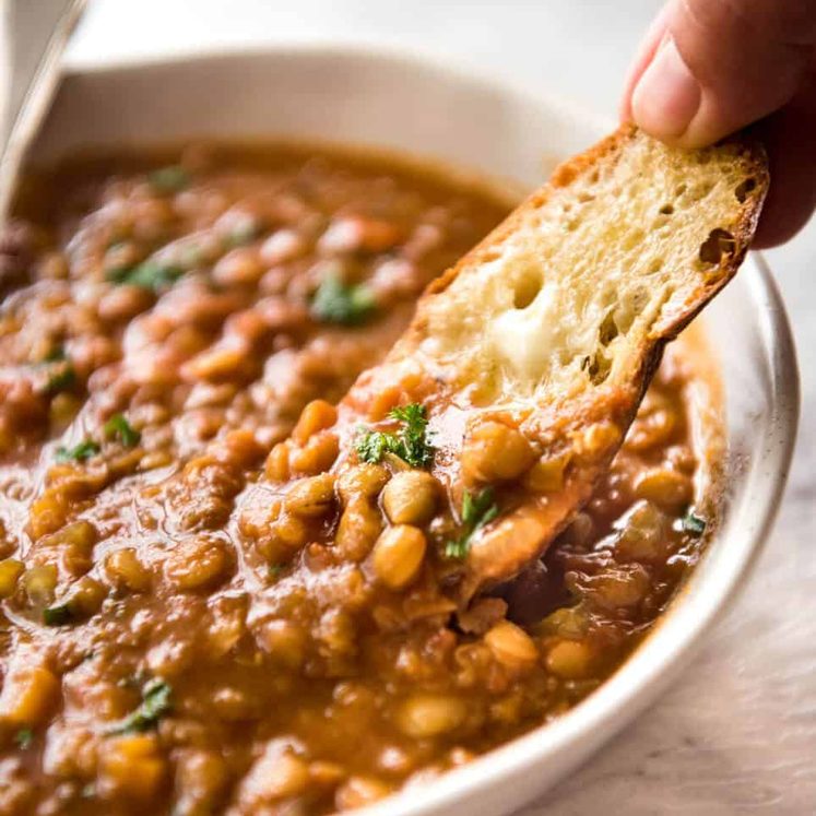 Why settle for a bland Lentil Soup when you make a standout one? Just a hint of spices and finishing it off with lemon zest makes all the difference! dev.recipetineats.com