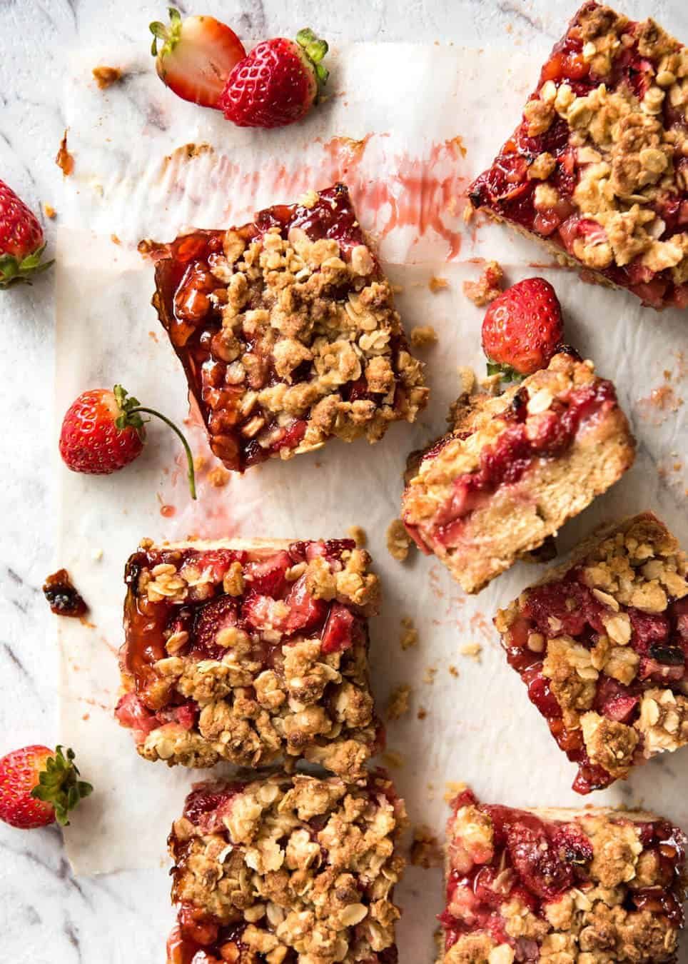 Fresh Strawberry Bars with a buttery biscuit base, topped with jam, fresh strawberries and a crumbly topping. No mixer, quick to make! dev.recipetineats.com